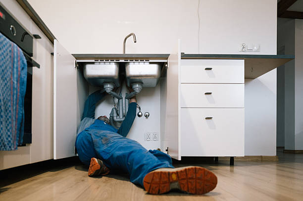 Professional Emergency Plumber technician working in Ironia, NJ